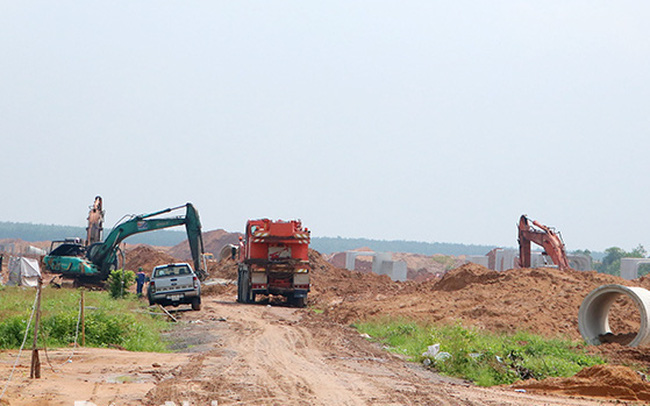 đất bị thu hồi thì nguyên tắc đền bù như thế nào một mảnh đất đang được san lấp